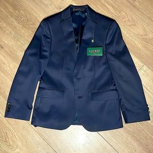 Brand new Boys Navy Blue blazer still has tags on it. Size 10R great condition.